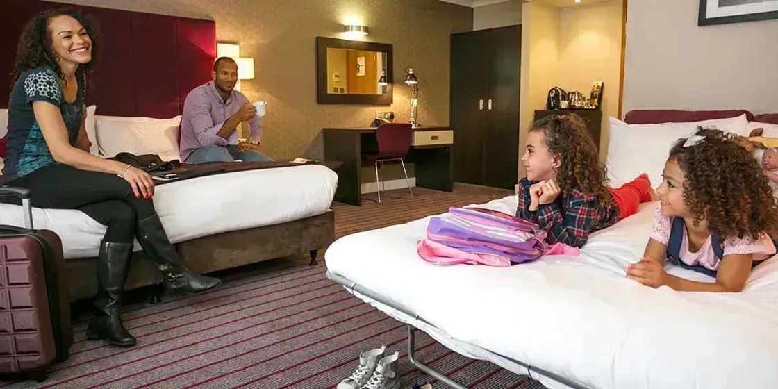 Family in hotel room at partner hotel near LEGOLAND Windsor
